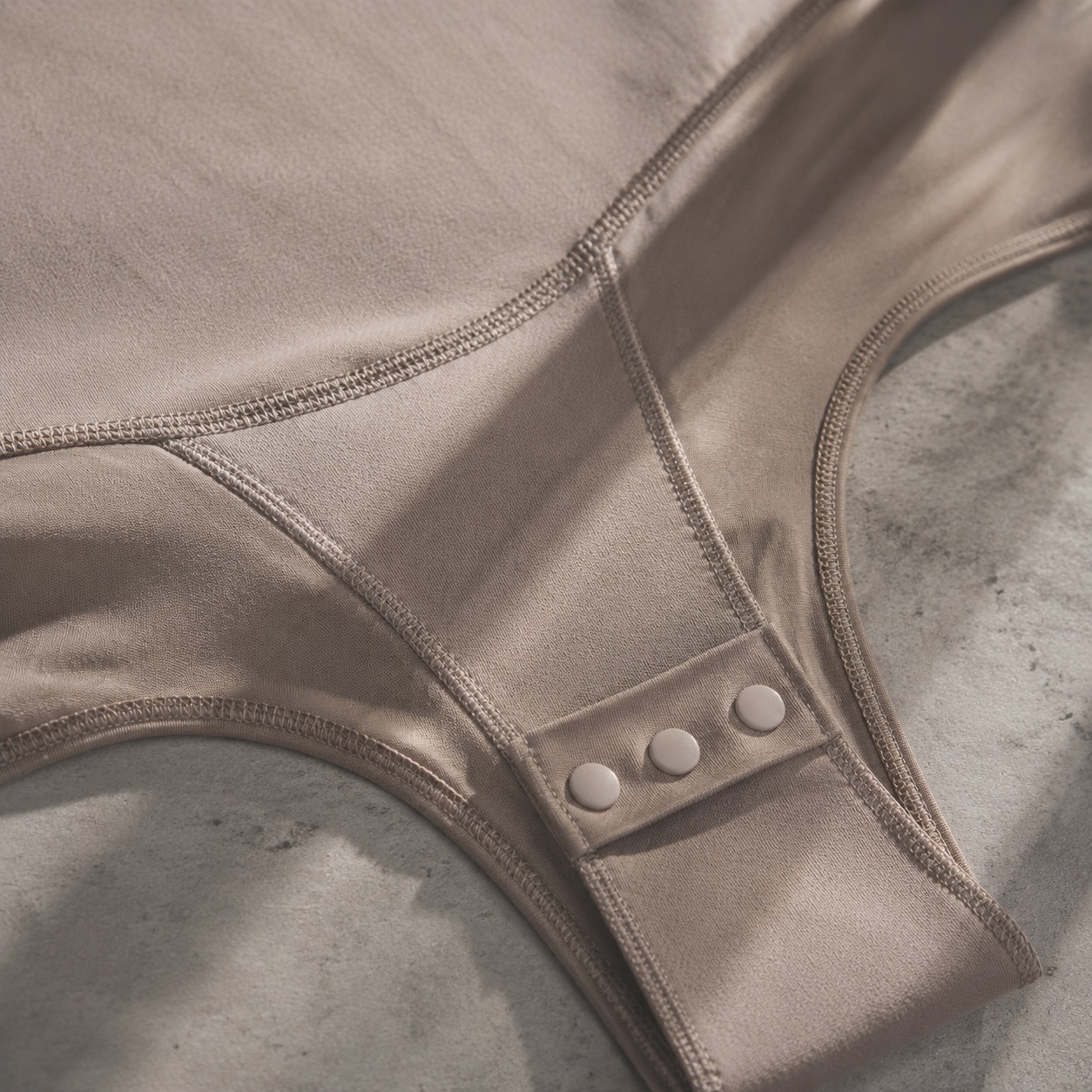 Badshot long-sleeve base layer bodysuit — Long-Sleeve Base Layers by FITS LIKE. close detail of the fabric and finish.