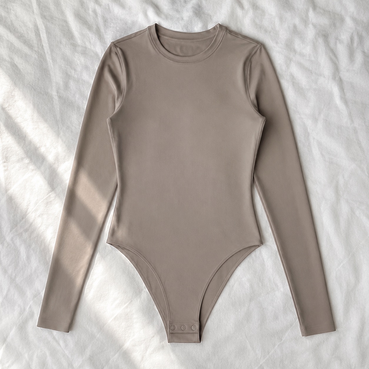 Badshot long-sleeve base layer bodysuit — Long-Sleeve Base Layers by FITS LIKE. product photograph on a white background.