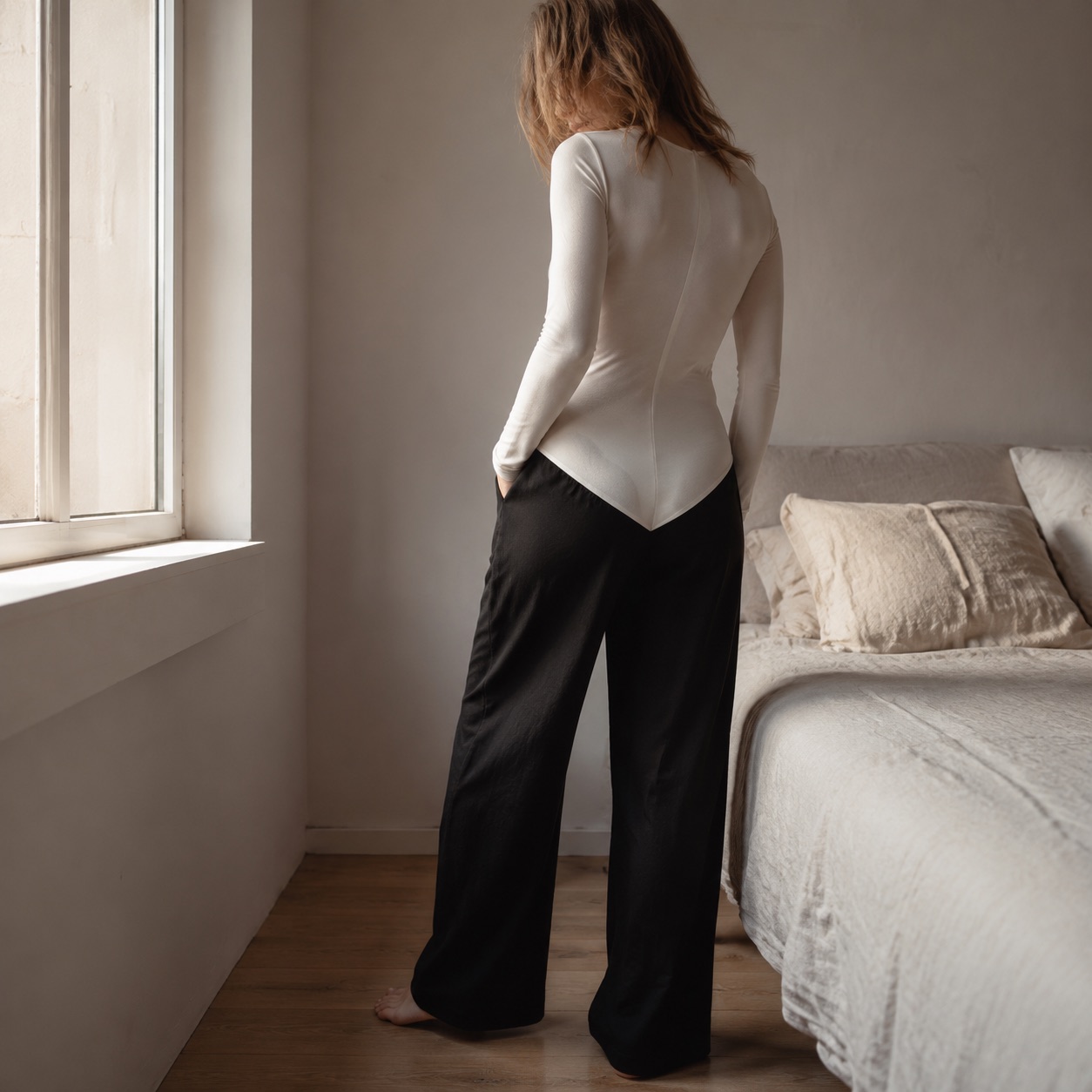 Badshot long-sleeve base layer bodysuit — Long-Sleeve Base Layers by FITS LIKE. worn by a model.