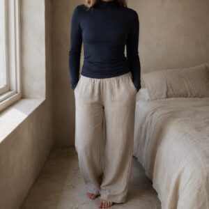 Rowledge high-neck long-sleeve base layer — Long-Sleeve Base Layers by FITS LIKE. worn by a model.
