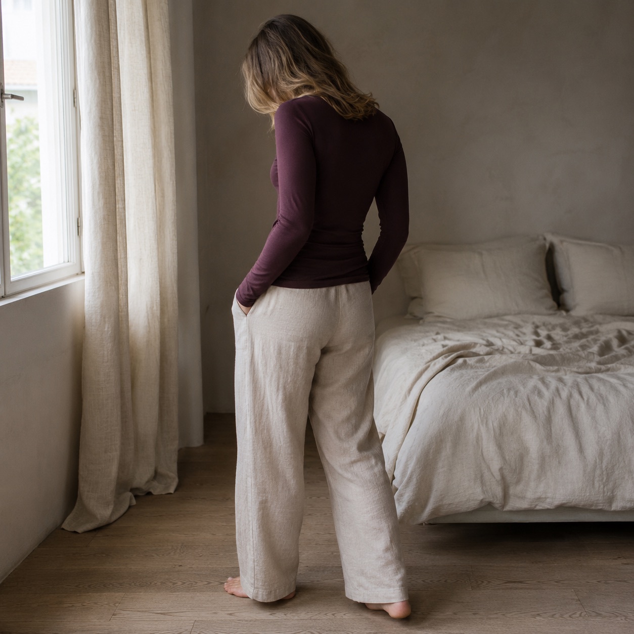 Ewshot crew-neck long-sleeve base layer — Long-Sleeve Base Layers by FITS LIKE. worn by a model.