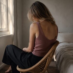 Bourne ribbed scoop-back tank — Rib Body Layers by FITS LIKE. worn by a model.